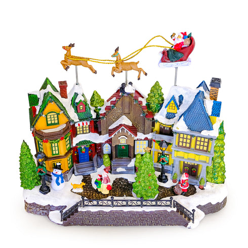Animated Christmas Village with Flying Santas leigh with reindeer and Rotating Tree