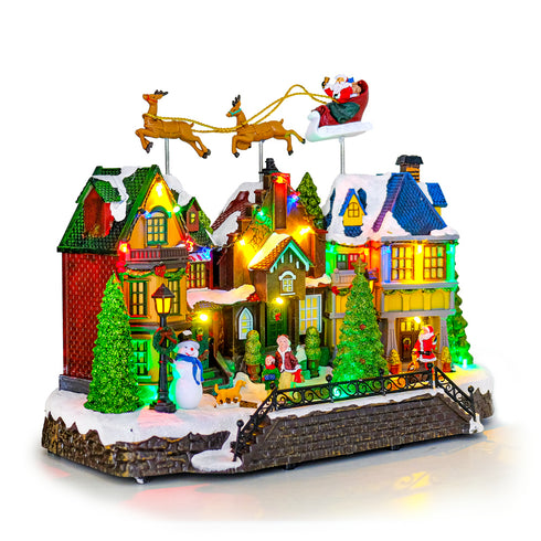 Animated Christmas Village with Flying Santas leigh with reindeer and Rotating Tree