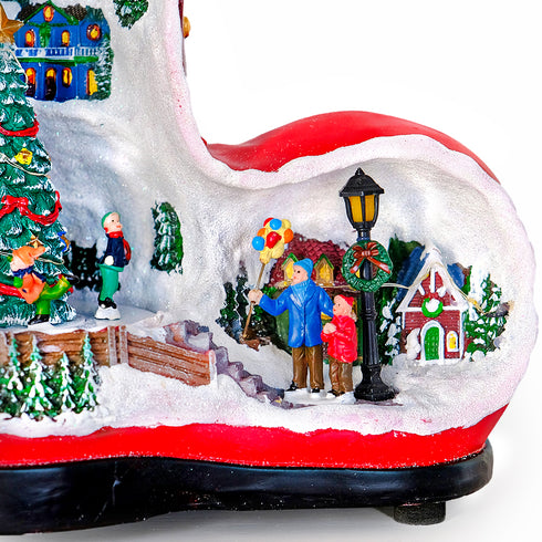 Collectible Design Animated Christmas Boot Village with Rotating Skiers and Flashing Lights